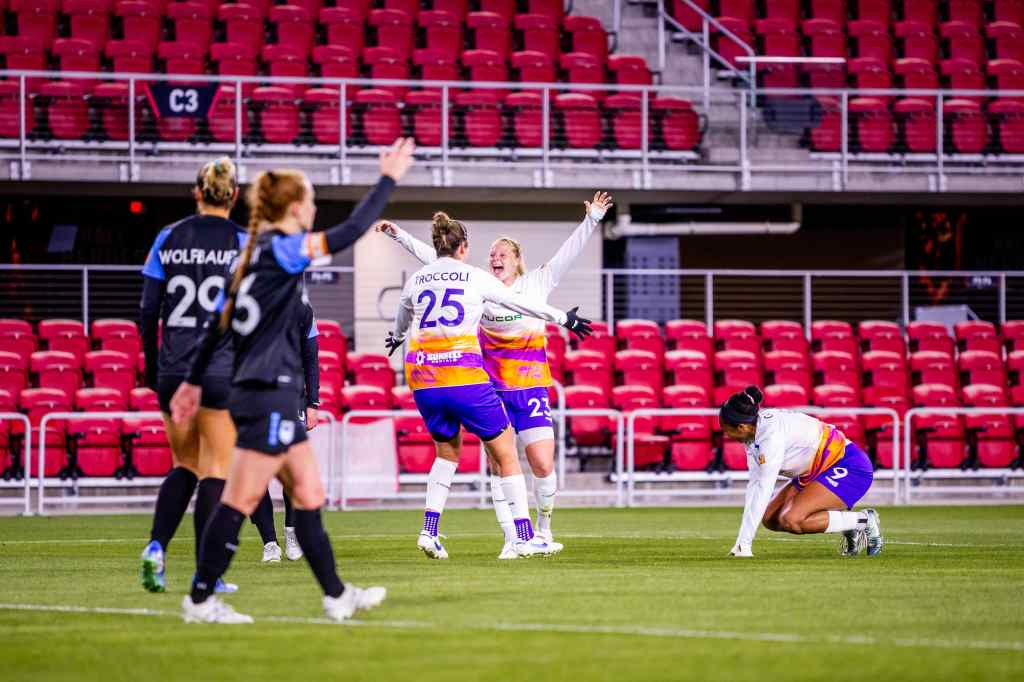 Riley Parker celebrates Sarah Troccoli's go-ahead goal against DC Power